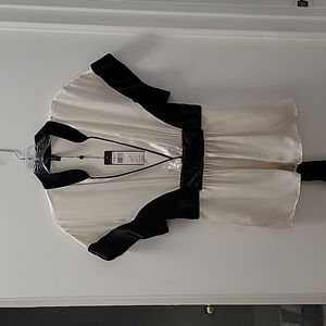 $198 BCBG blouse selling for $20